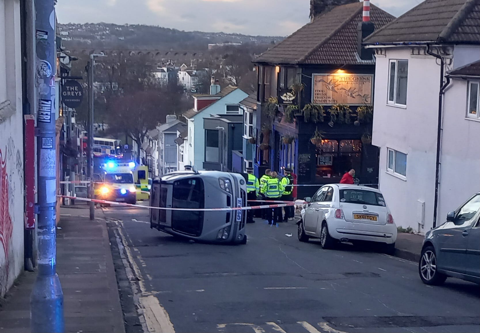 Brighton road closed after car flip