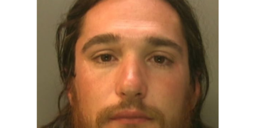 Police search for man convicted of stalking his ex