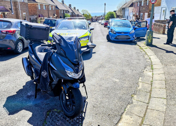 Motorcyclist crashes into car during police chase