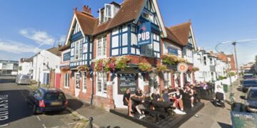 Three charged over Hove pub shooting