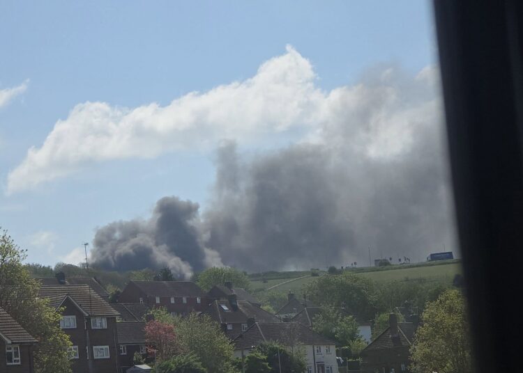 Fire service warns avoid area as crews tackle wheelie bin blaze