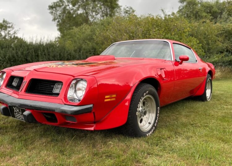 Driver charged over classic car crash