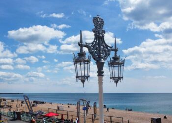 First of Brighton’s restored old streetlights goes back up on the seafront