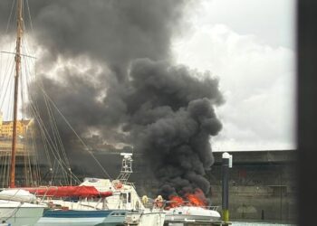 Firefighters put out blaze on boat at Marina