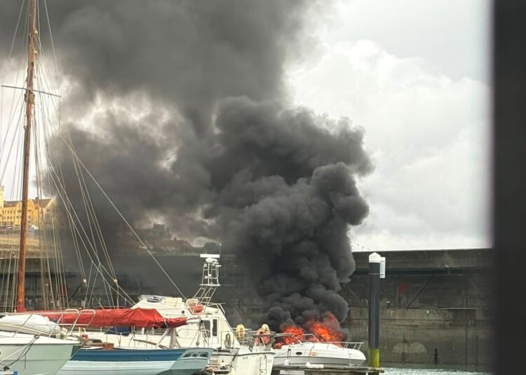 Firefighters put out blaze on boat at Marina