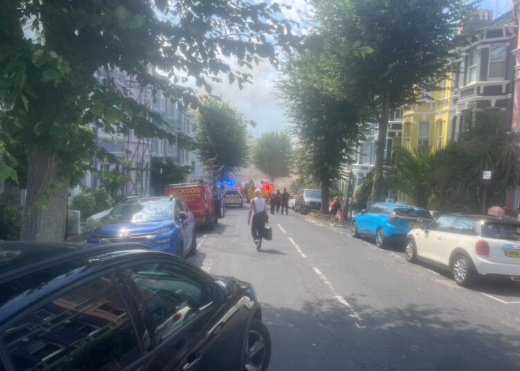 Fire crews battle flat fire